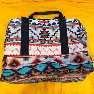 Aztec, tribal tote bag. Brand new. Never used. Bottom compartment for shoes.